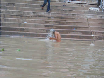 Man Washing in the river Ganges
